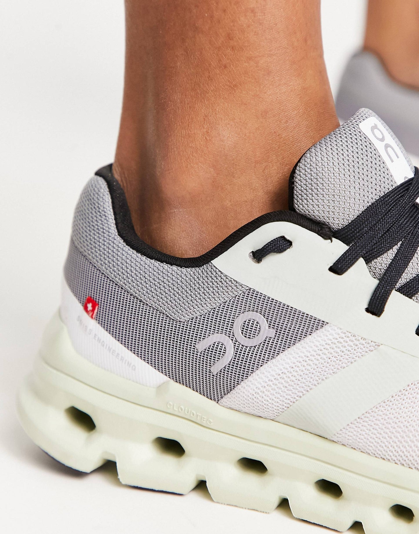 On Running Cloudrunner trainers in white and mint