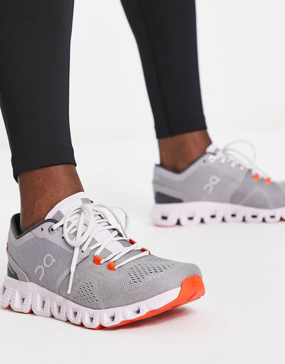 On Running Cloud X trainers in grey and pink