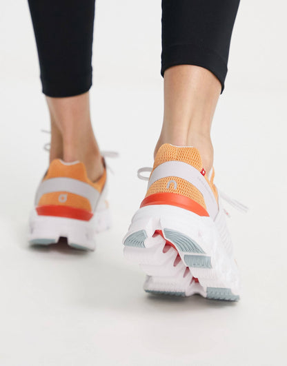 On Running Cloudswift trainers in orange and white